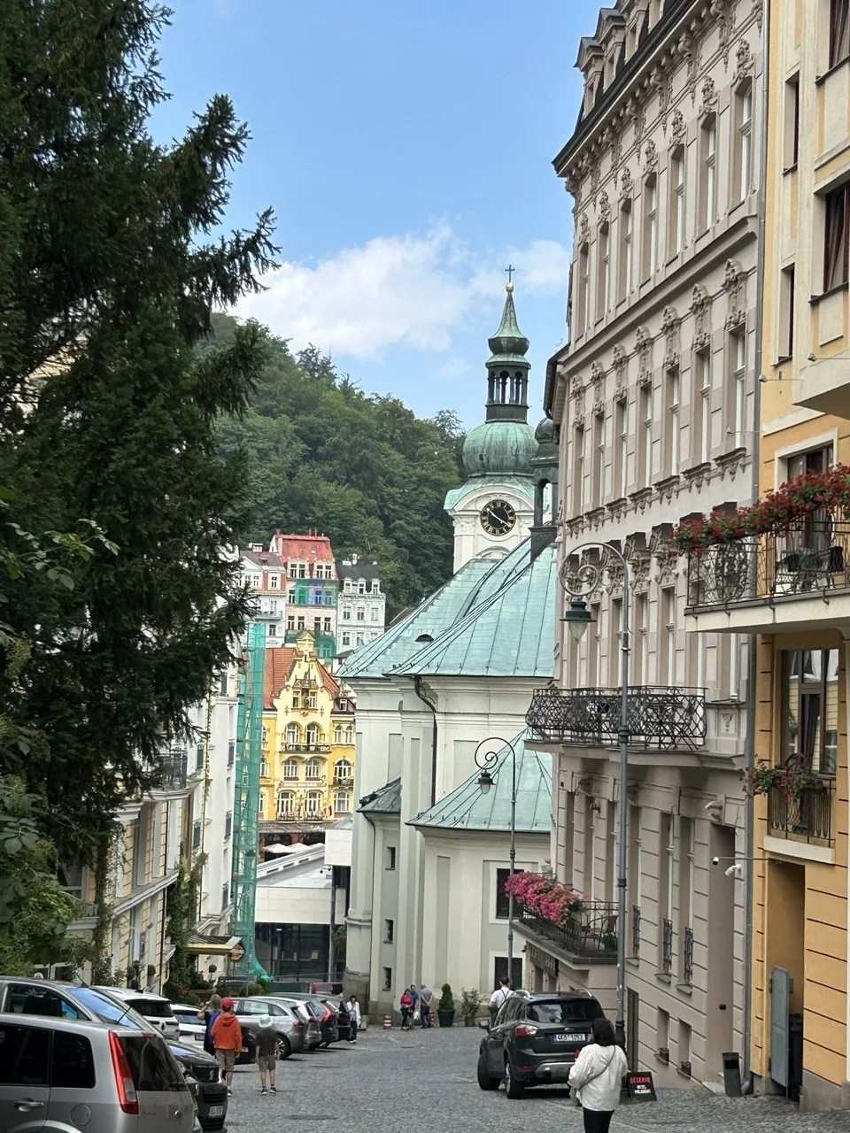 Colorful streets and church tower in Karlovy Vary